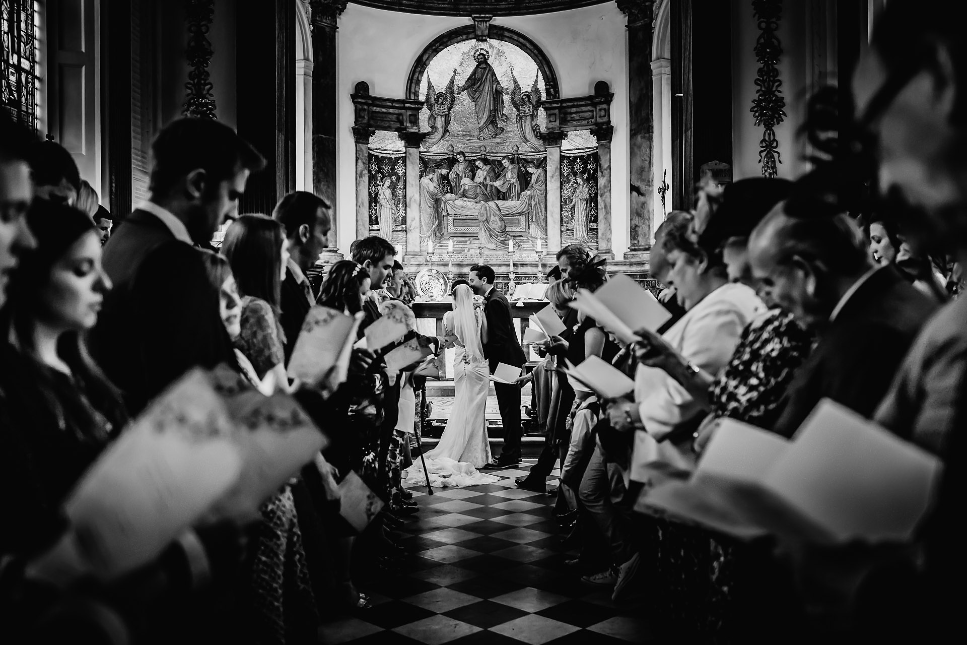 photo of jess and phil in the chapel, capesthorne hall wedding photographer 