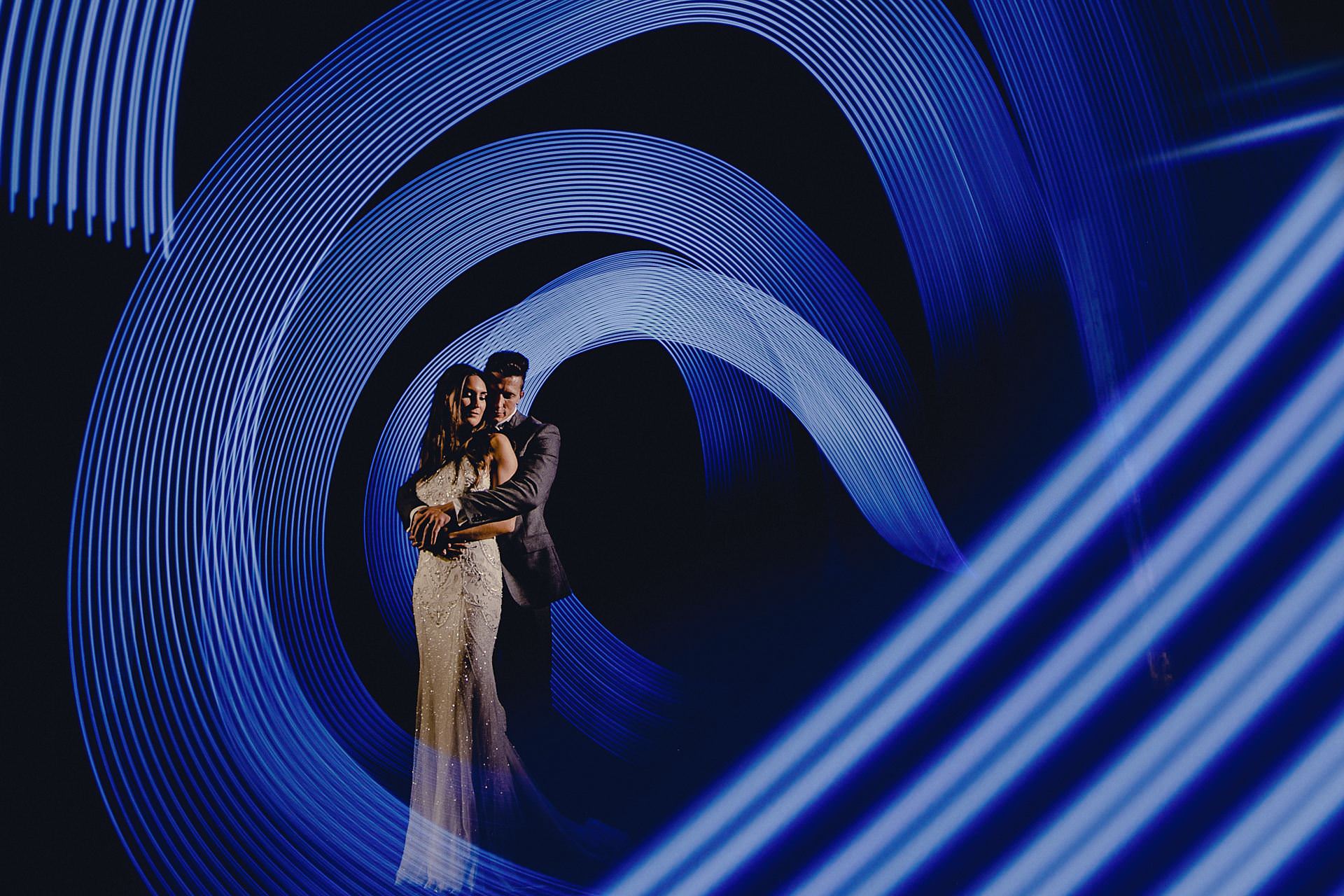 light painting wedding photo at victoria warehouse. long exposure, yongnuo ice light, canon cameras