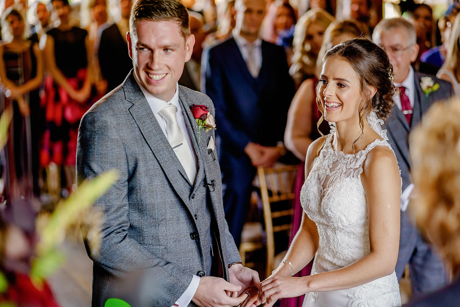 bride and groom smiling during wedding ceremony at the Hillbark, wirral