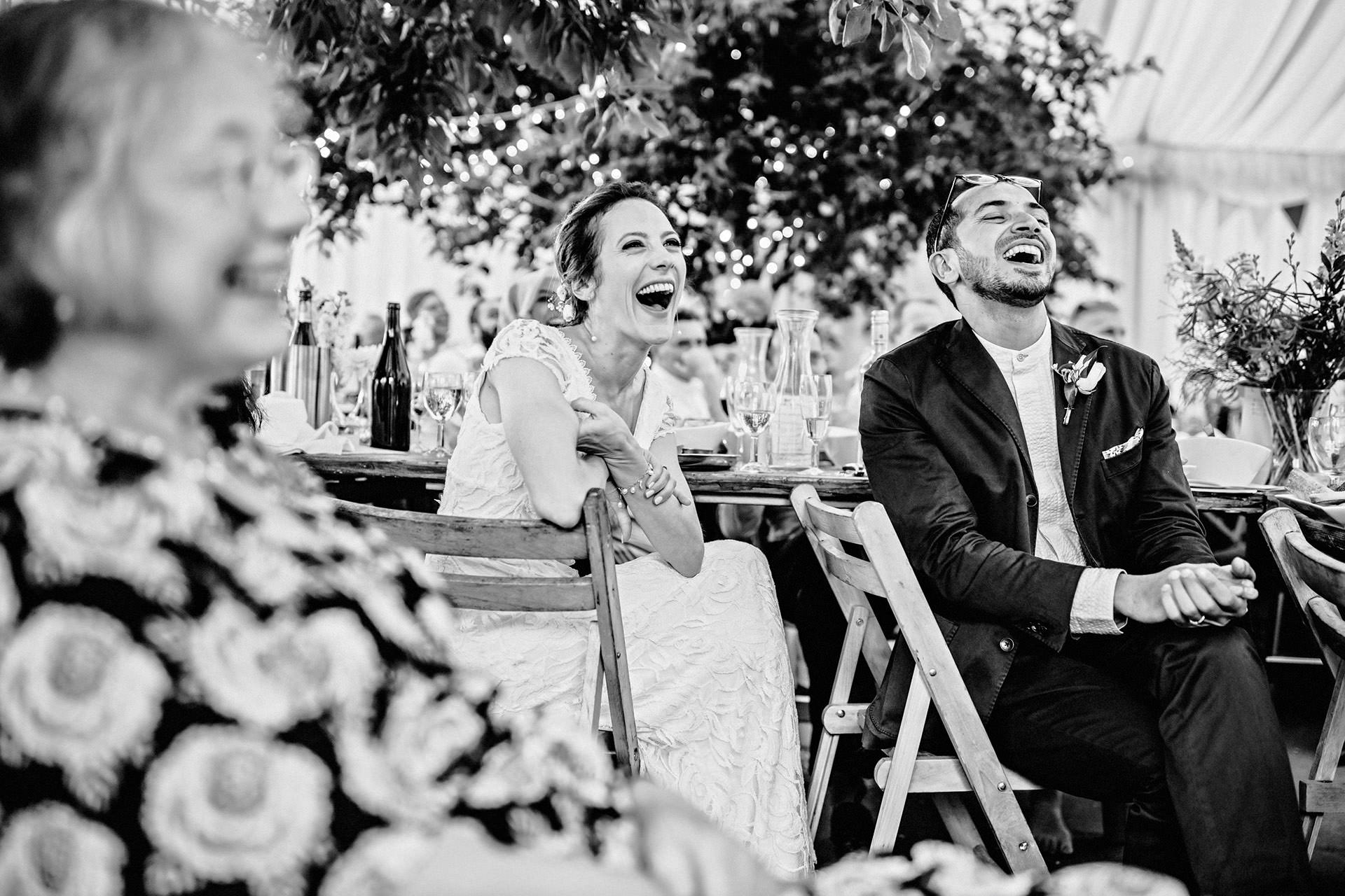 laughter, wedding photos in the marquee