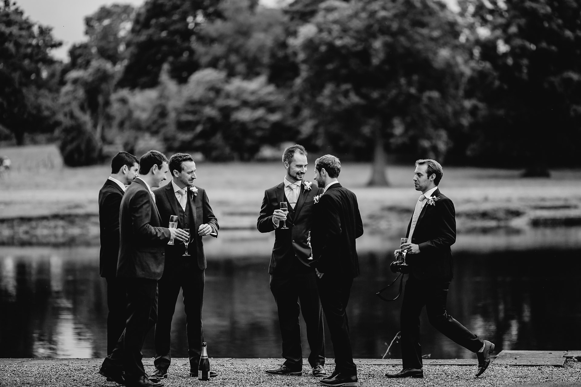 groomsmen getting ready by the lake- capesthorne - hall 
