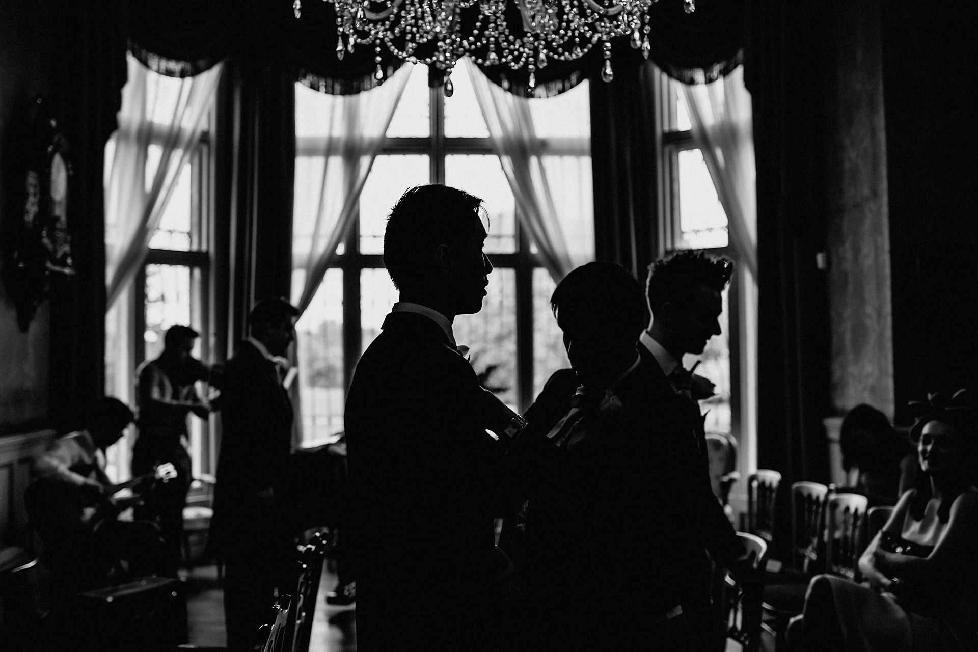 silhouette photo of groom