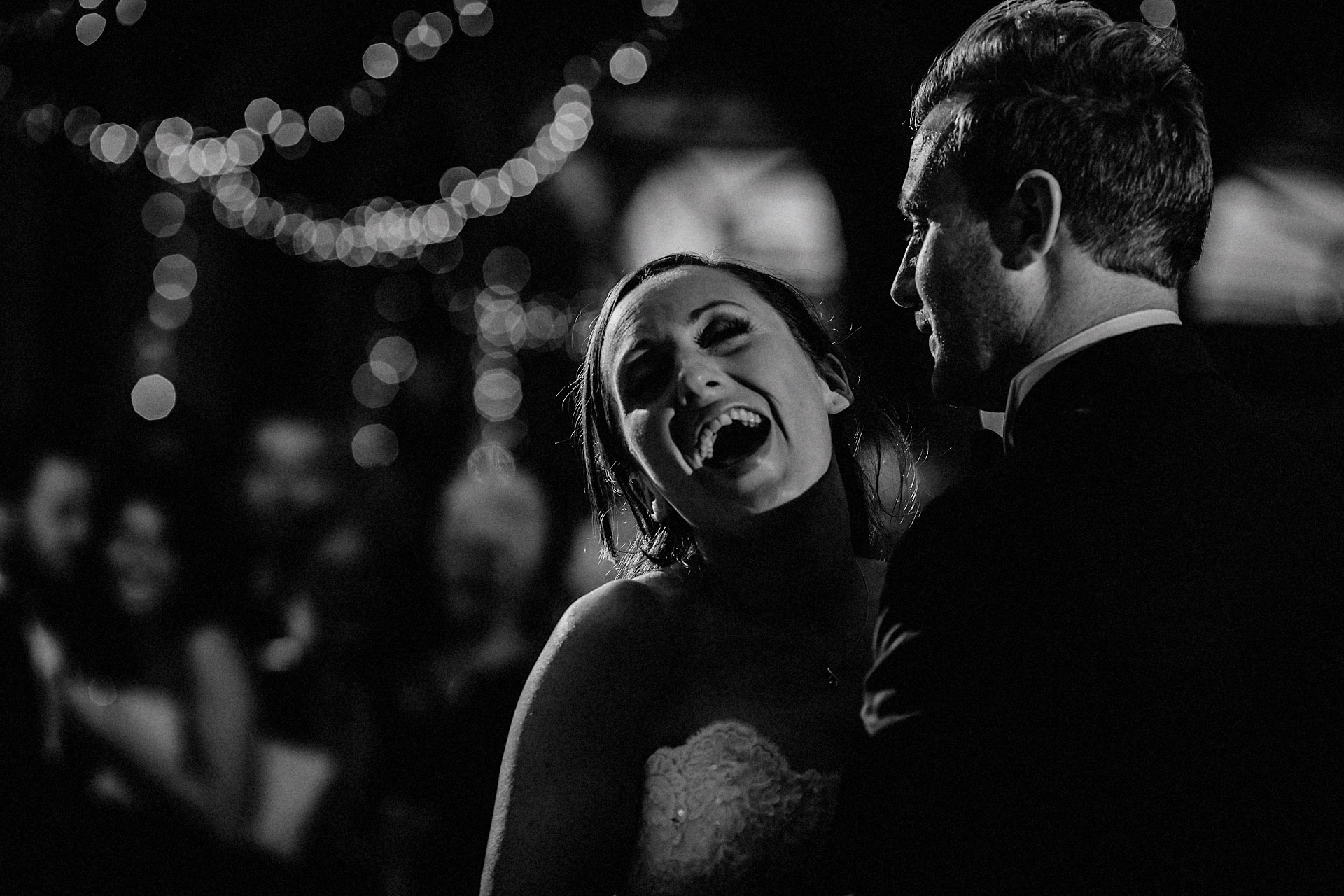 bride laughing during the first dance 
