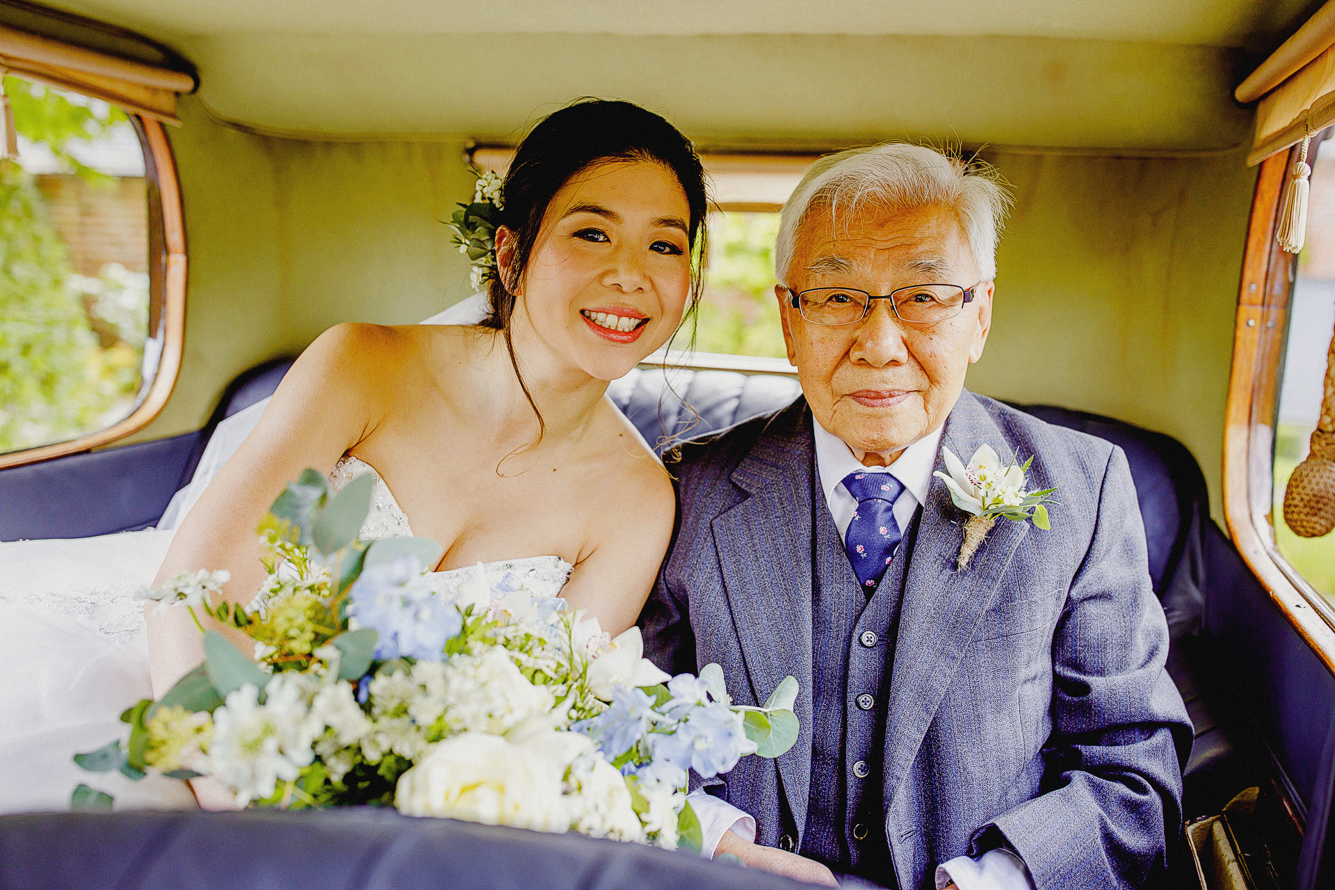 kiki and her grandfather at the wedding 