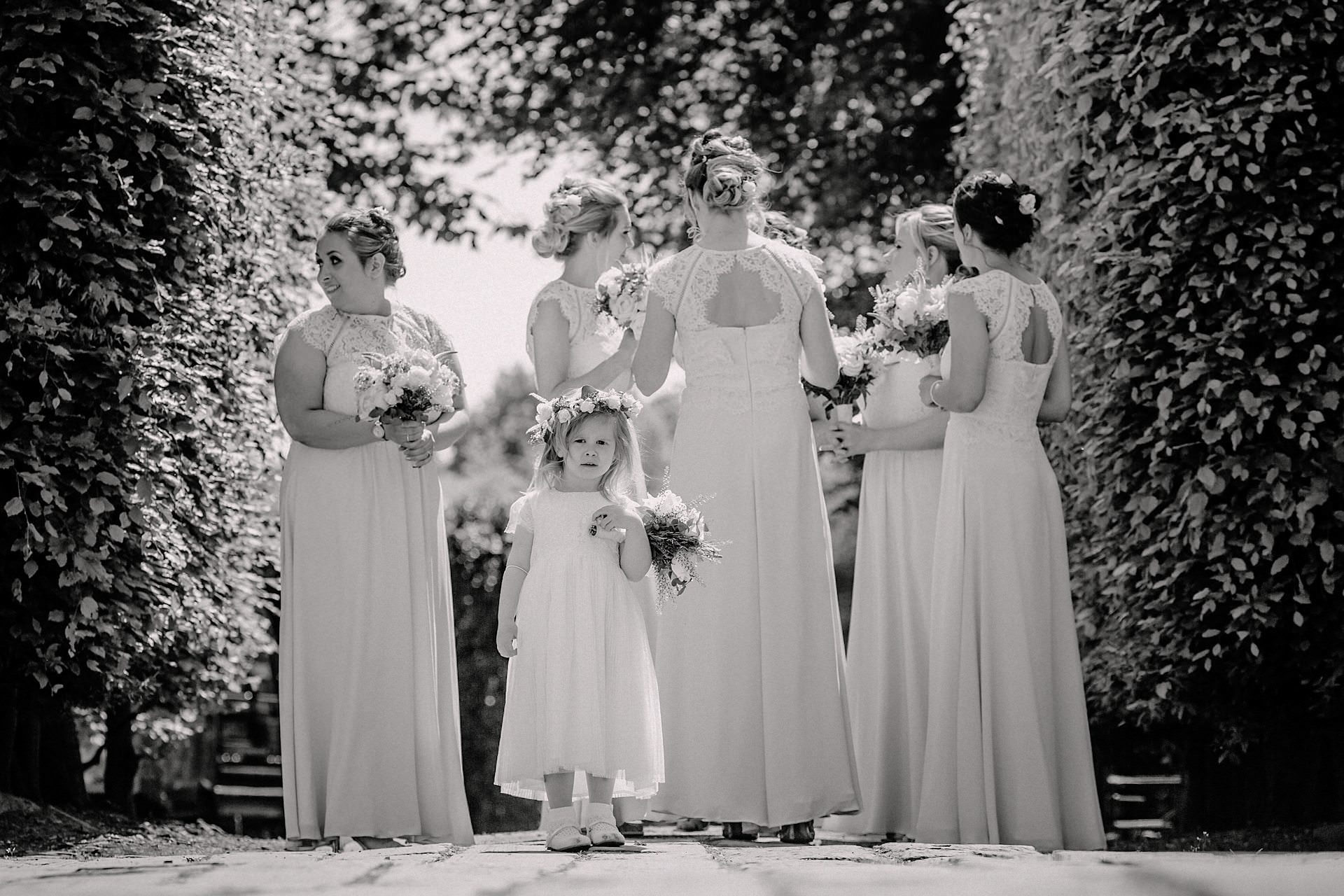 image of the bridesmaids and flower girl in black and white
