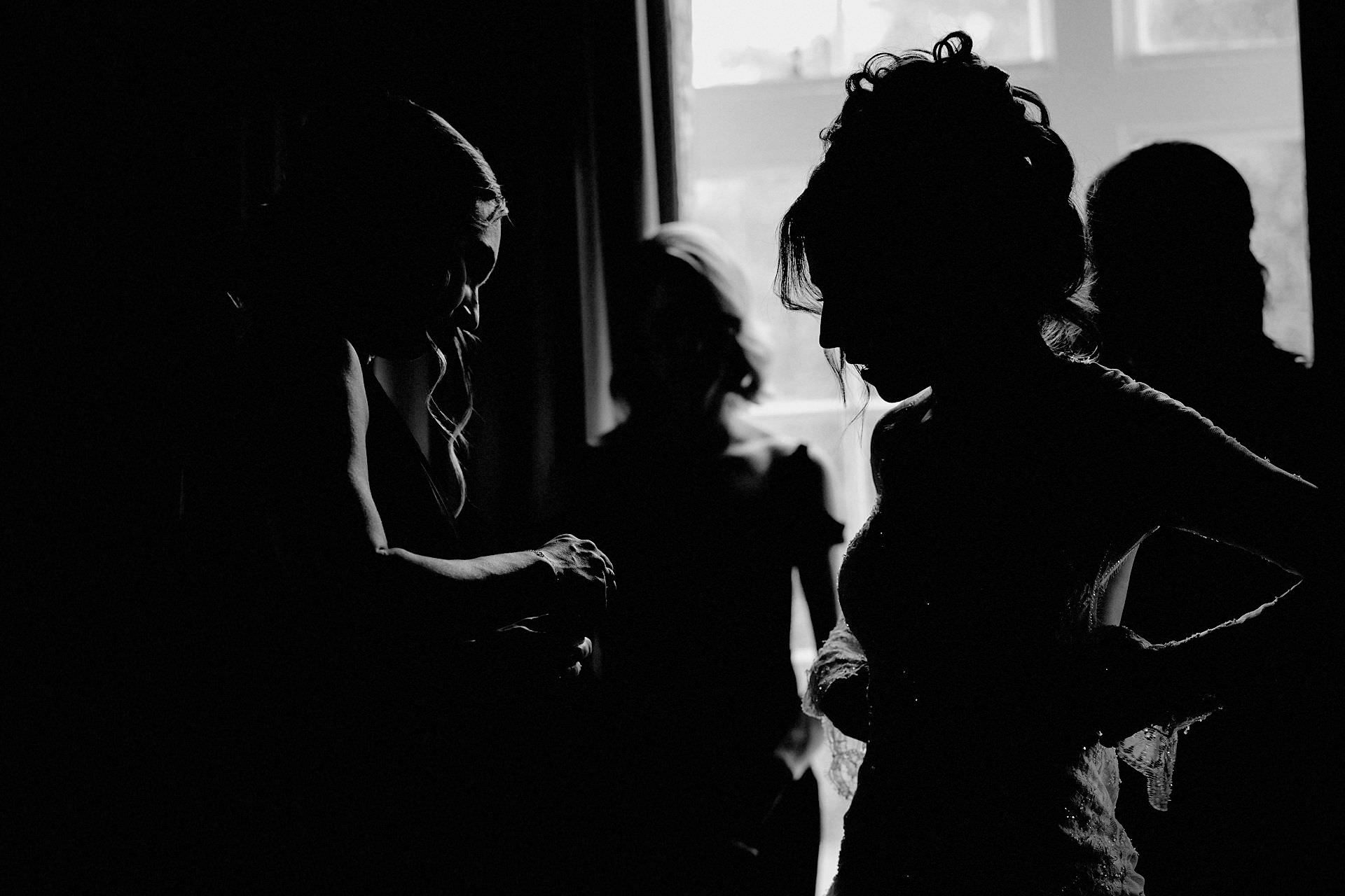silhouette during bridal preparations
