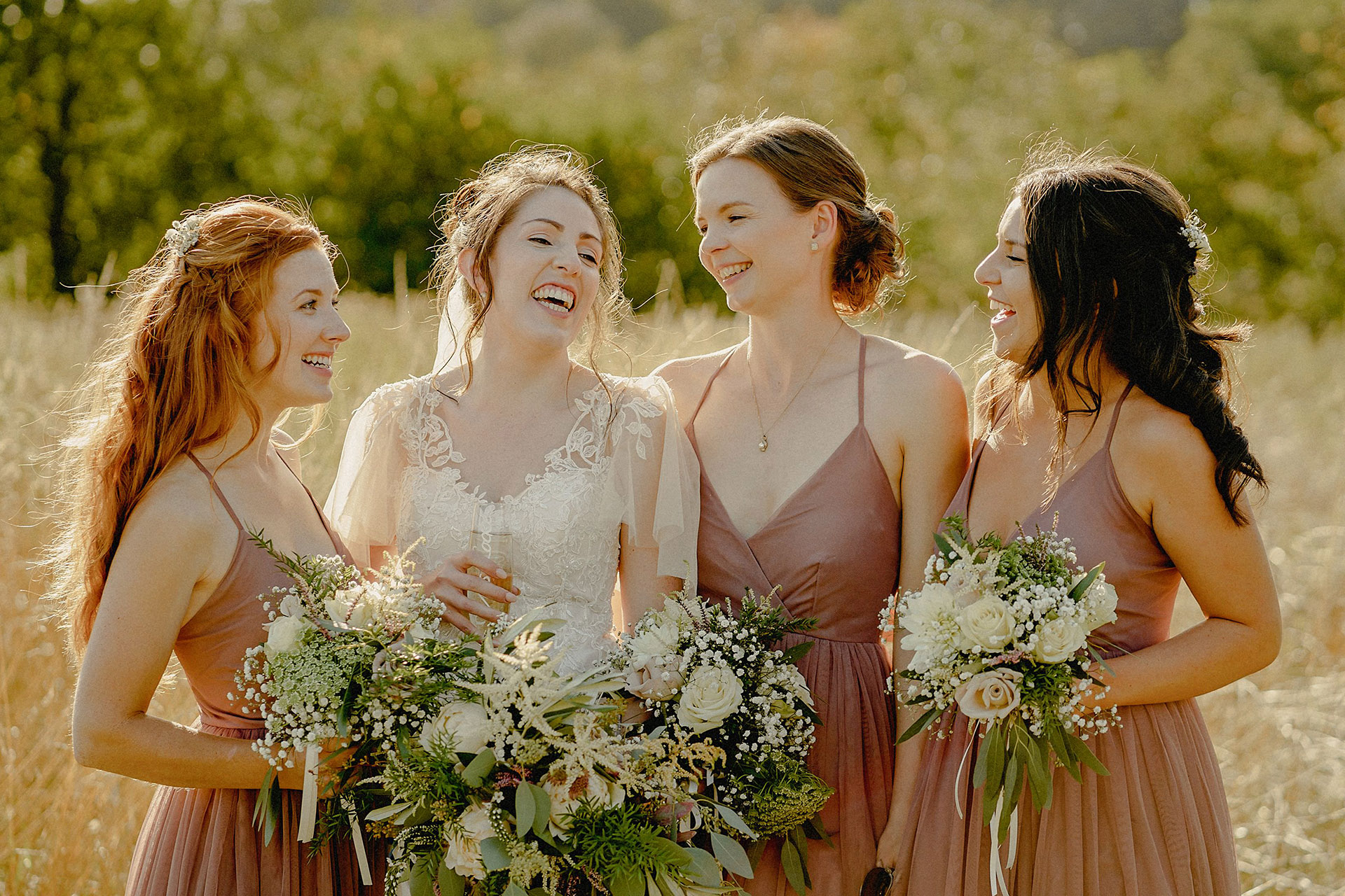 bride and bridesmaids having a good time
