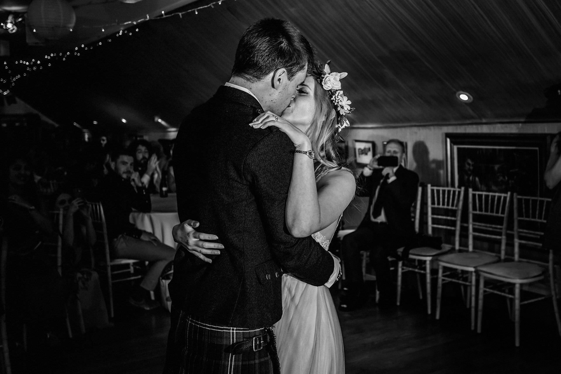 kiss after first dance as man and wife