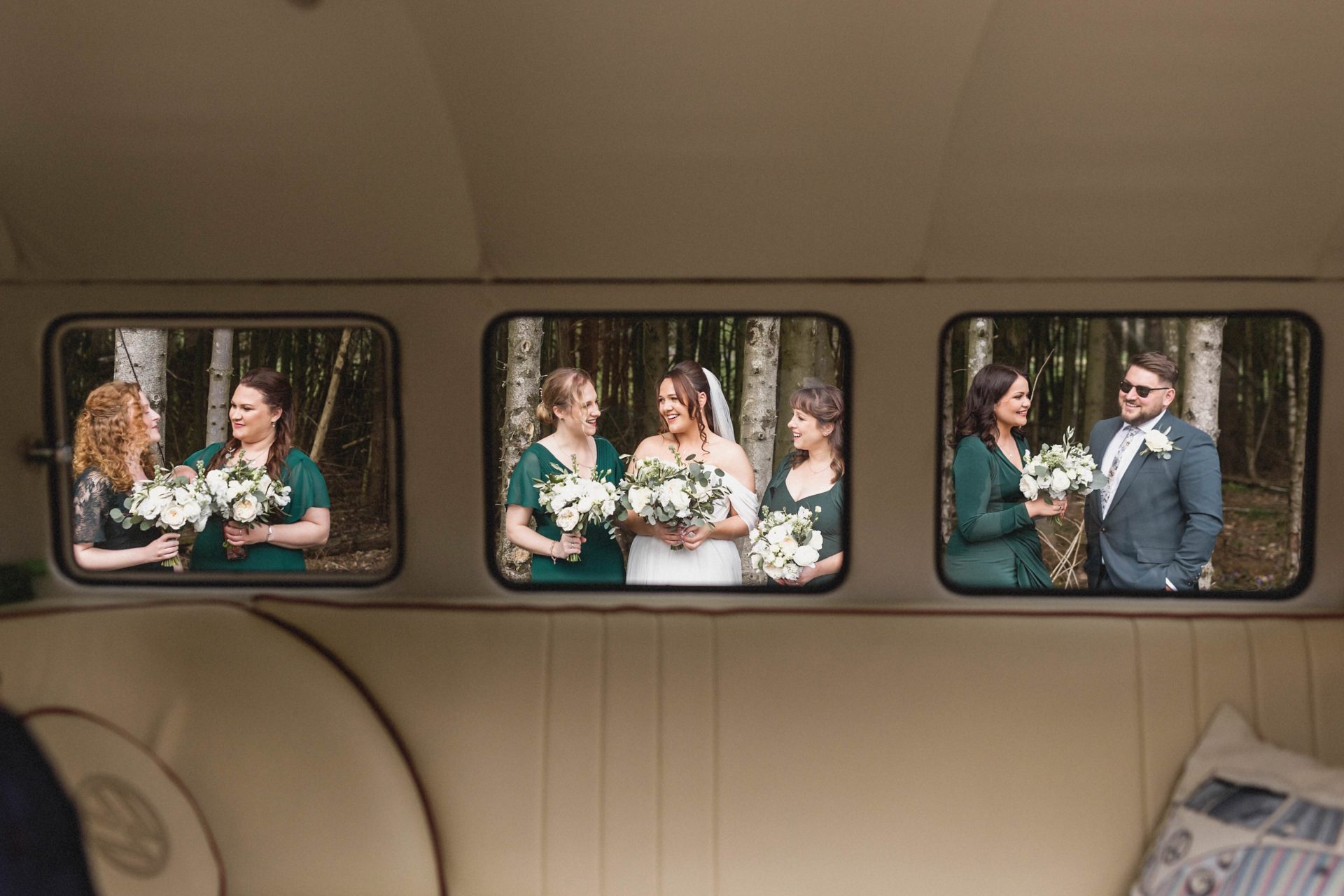 bride and bridesmaids next to vw camper van