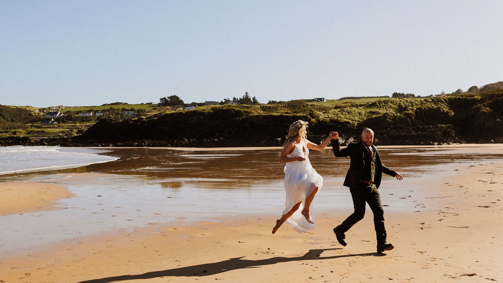 bride and groom on the beach